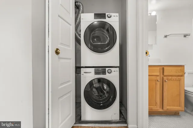 a utility room with dryer and washer