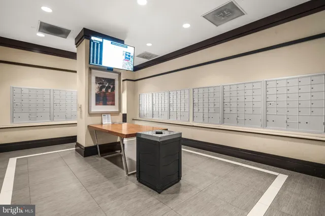 a kitchen with a sink and large window