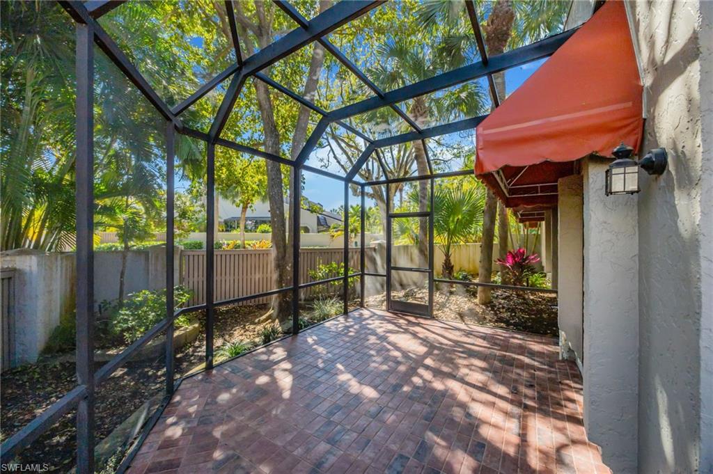 121 Bears Paw Trail Naples, FL 34105 - Photo 25 of 39 a view of a pathway with a backyard