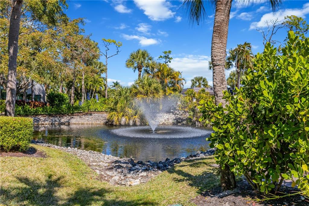 121 Bears Paw Trail Naples, FL 34105 - Photo 27 of 39 a view of a water fountain in front of a house
