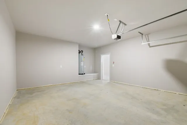 a view of a chairs and table in a back yard of the house