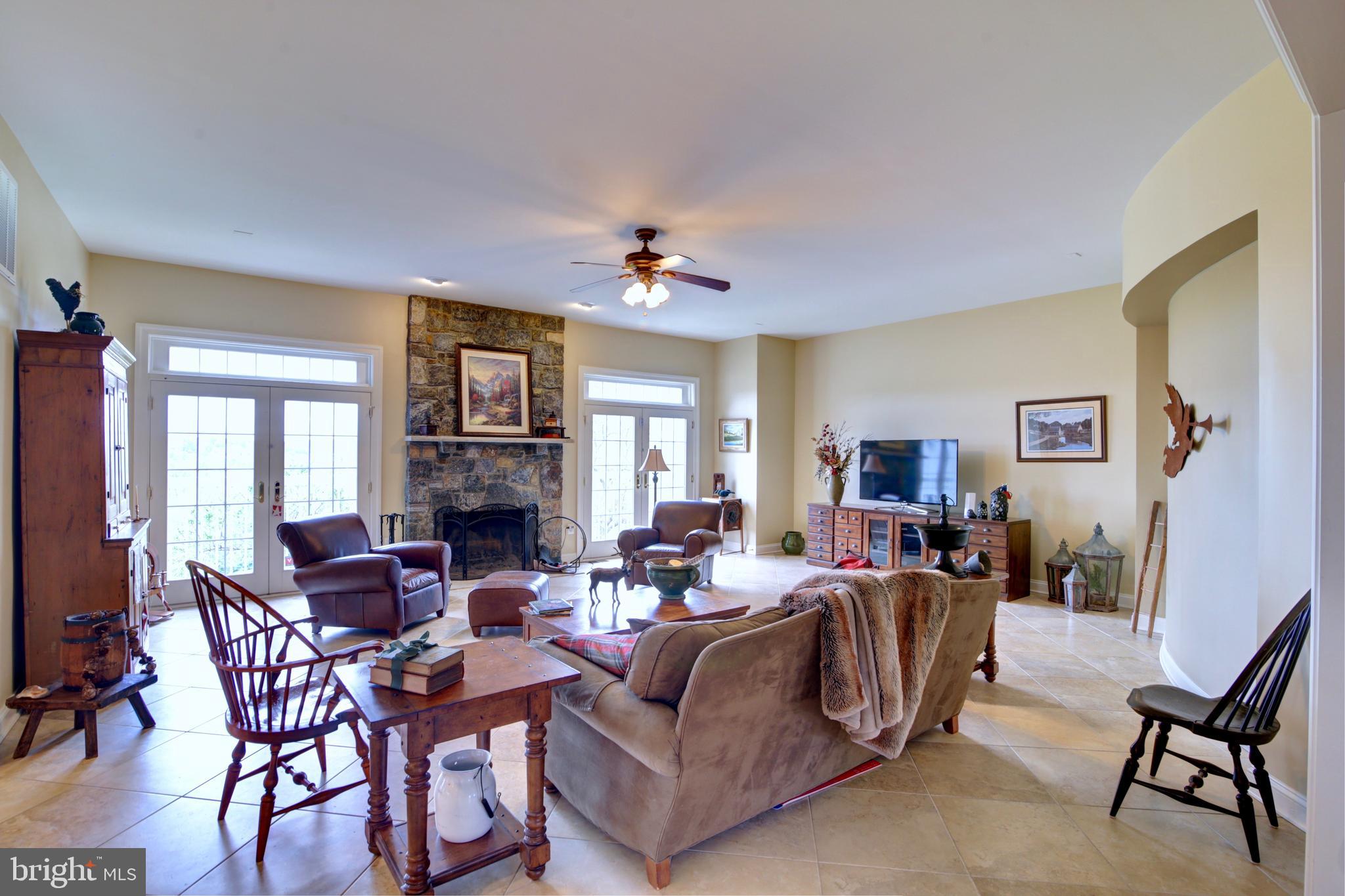 22077 Oatlands Road Aldie, VA 20105 - Photo 14 of 51 Family Room with Stone Wood Burning Fireplace