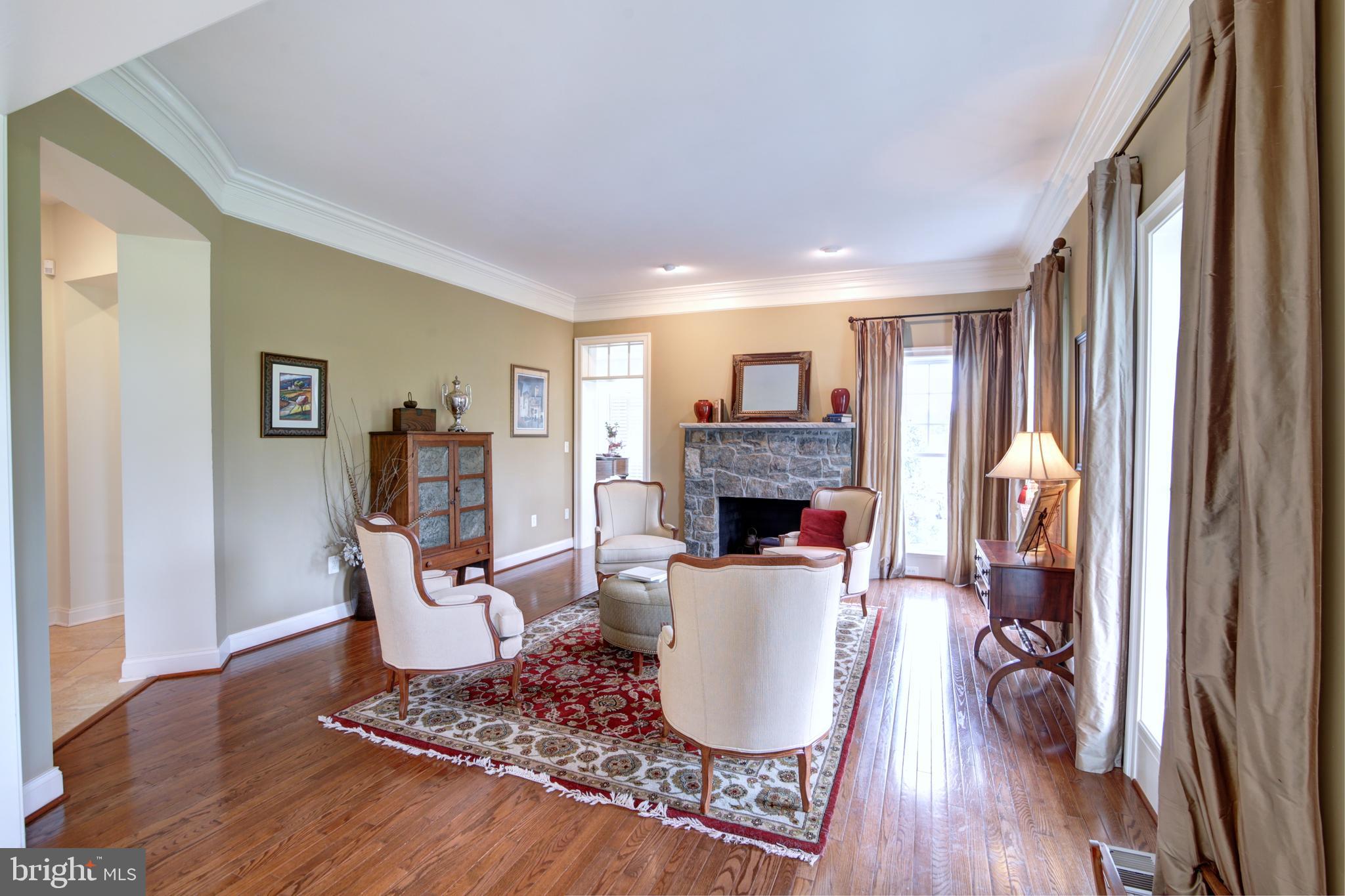 22077 Oatlands Road Aldie, VA 20105 - Photo 18 of 51 Formal Living Room w/ Wood Burning Fireplace