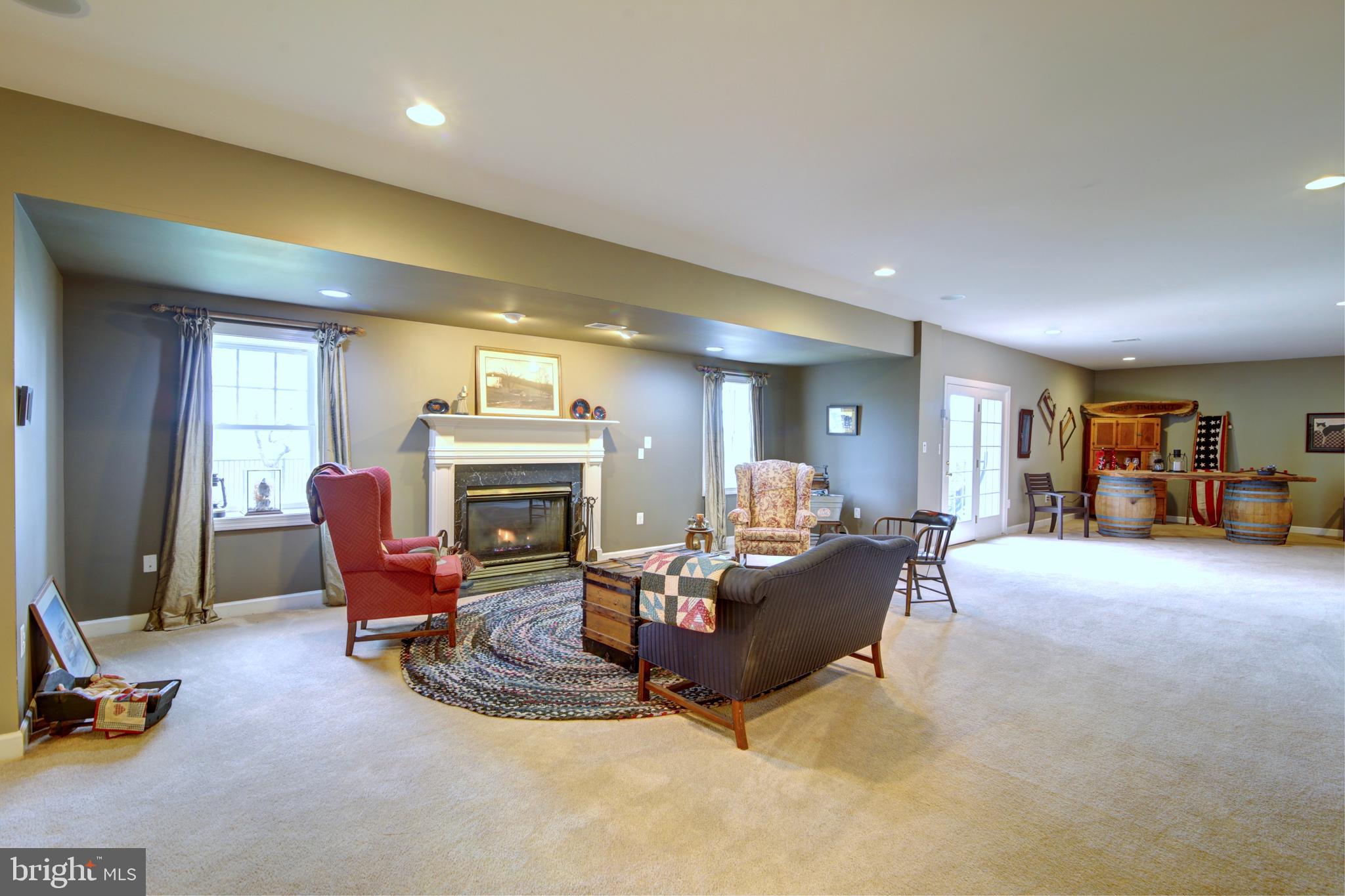 22077 Oatlands Road Aldie, VA 20105 - Photo 33 of 51 Lower Level Great Room with Gas Fireplace