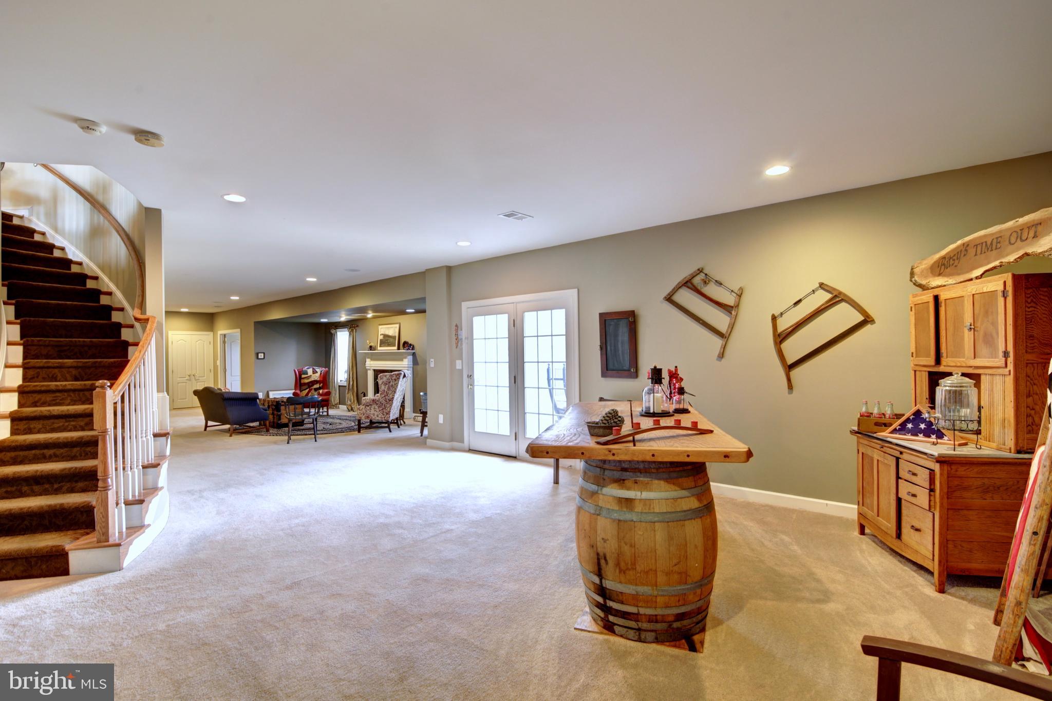 22077 Oatlands Road Aldie, VA 20105 - Photo 34 of 51 Lower Level Game Room with walkout to pool