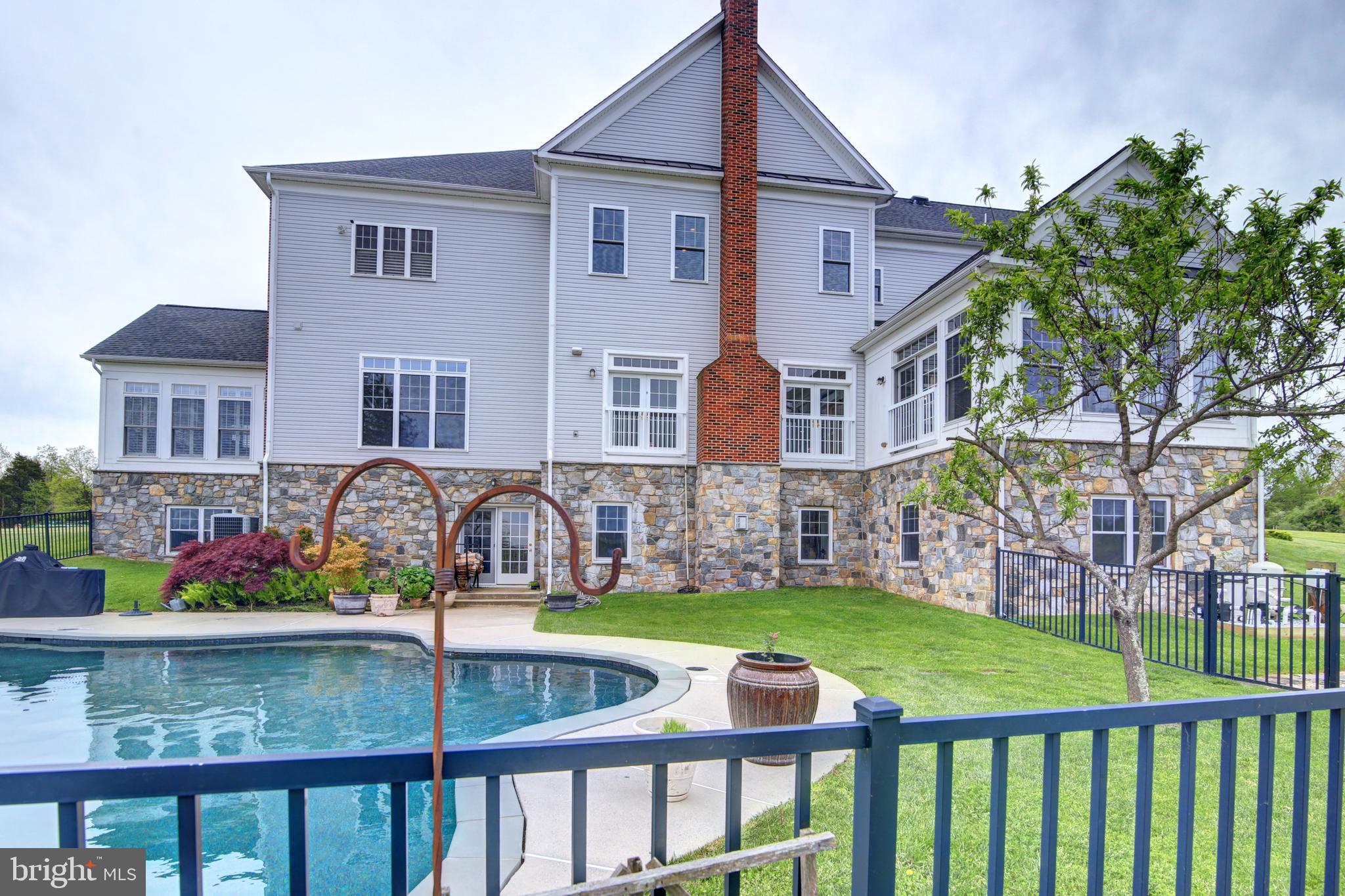 22077 Oatlands Road Aldie, VA 20105 - Photo 44 of 51 Full Fenced Pool Area