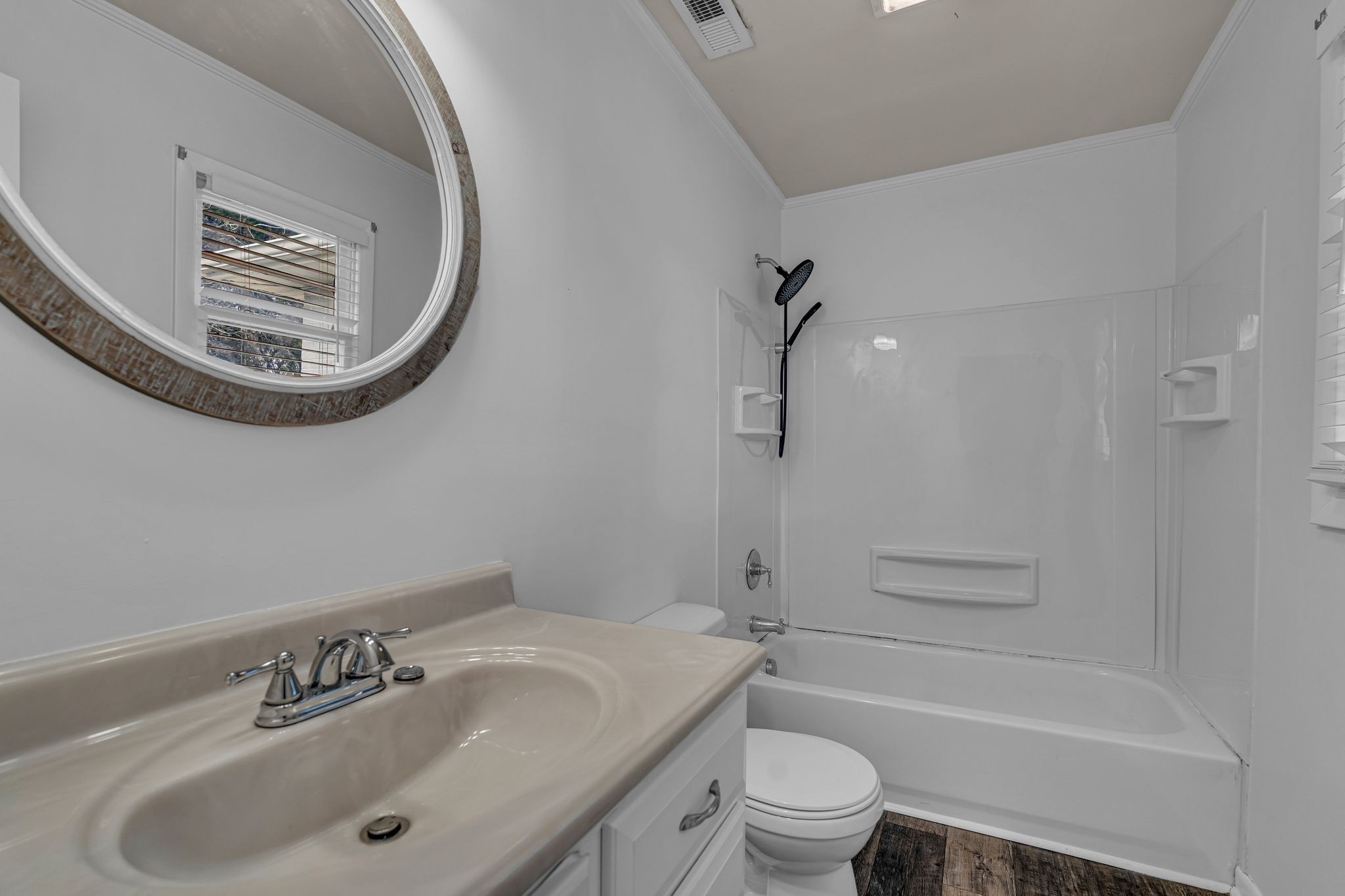 1102 North High Street Winchester, TN 37398 - Photo 18 of 27 a bathroom with a sink a toilet and a bathtub