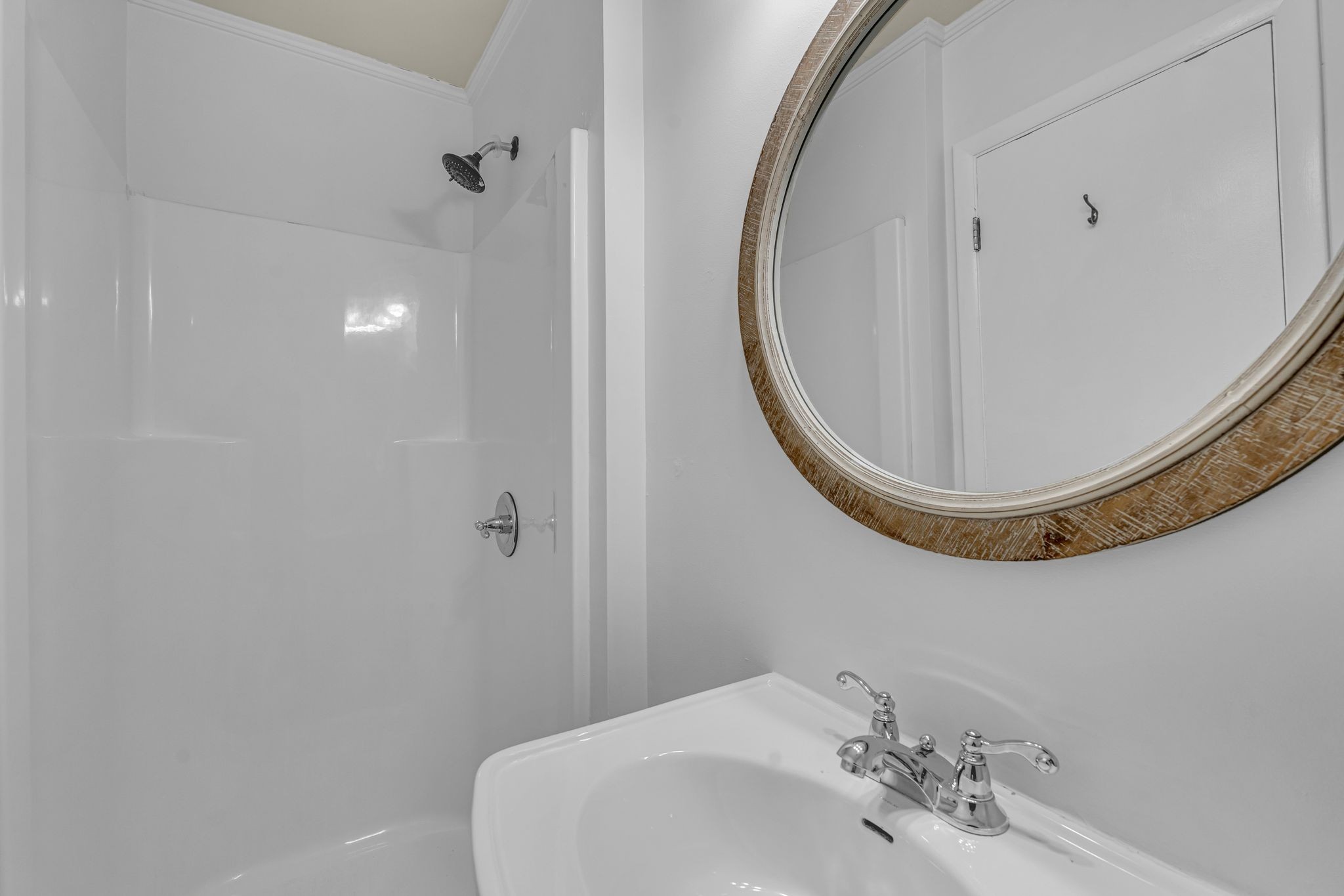 1102 North High Street Winchester, TN 37398 - Photo 20 of 27 a bathroom with a sink and a mirror