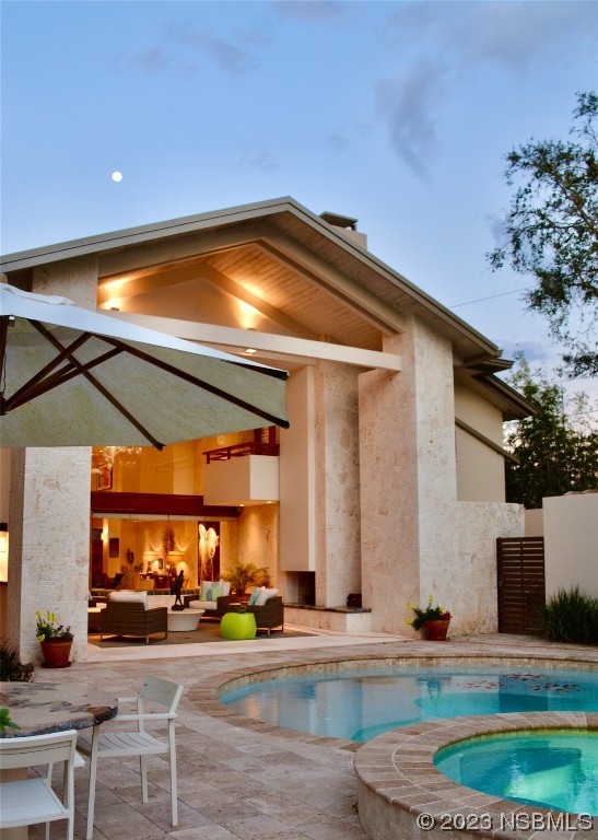 1006 South Riverside Drive Edgewater, FL 32132 - Photo 17 of 75 a view of a house with a patio