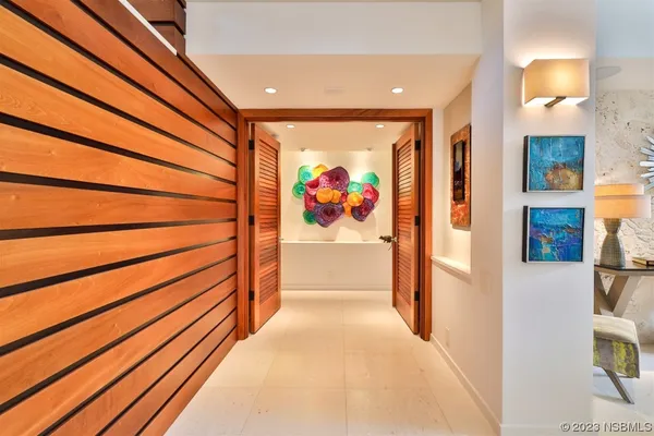 a bedroom with two beds and a couch