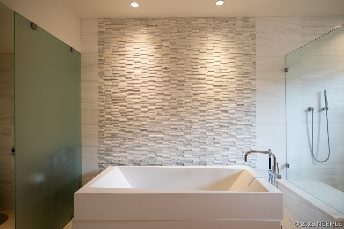 1006 South Riverside Drive Edgewater, FL 32132 - Photo 41 of 75 a bathroom with a shower