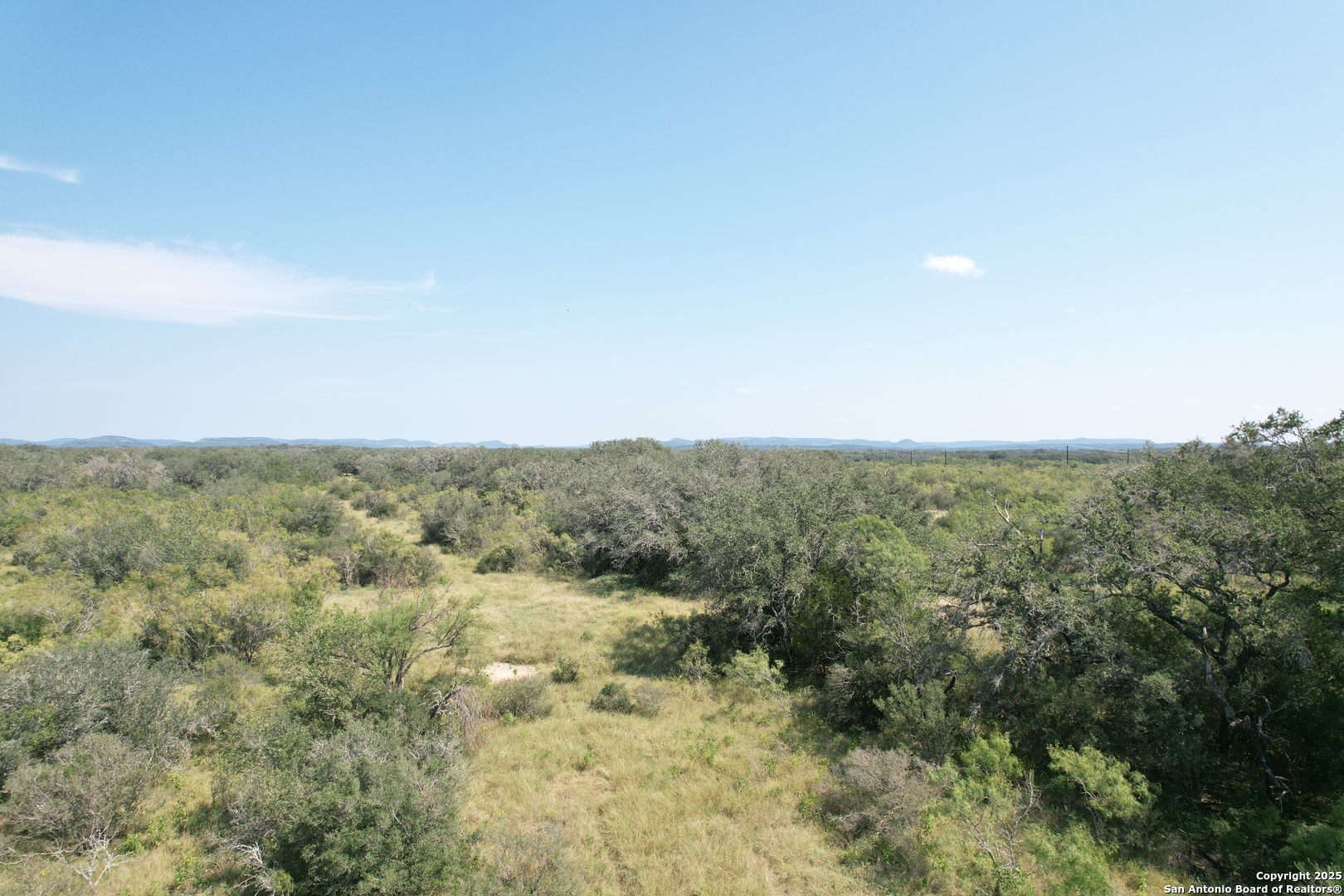 33 Utopia Forest D'Hanis, TX 78850 - Photo 9 of 19 a view of a field with an ocean