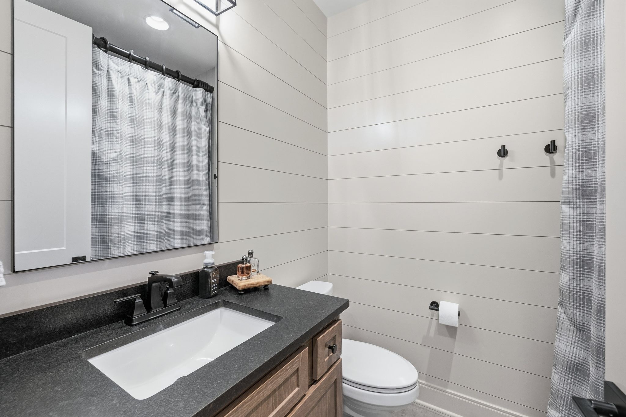 1733 Rigsby Avenue Murfreesboro, TN 37129 - Photo 39 of 57 a bathroom with a sink toilet and shower
