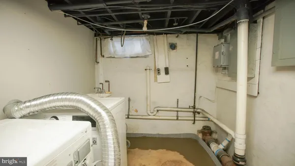 a water heater and table in a room