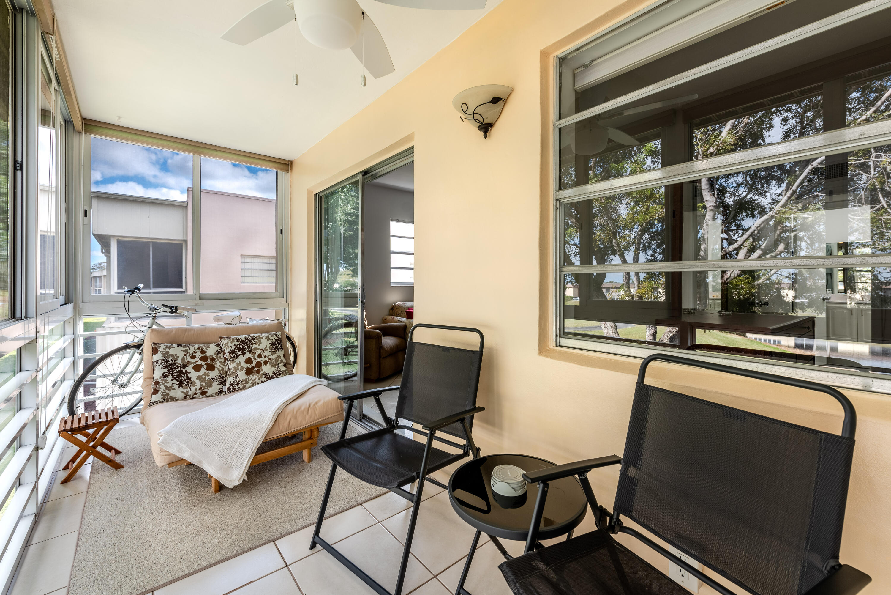 369 Capri H Delray Beach, FL 33484 - Photo 20 of 37 a living room with furniture