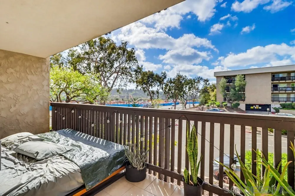 6416 Friars Road, Unit 111 San Diego, CA 92108 - Photo 14 of 21 a balcony view with a garden