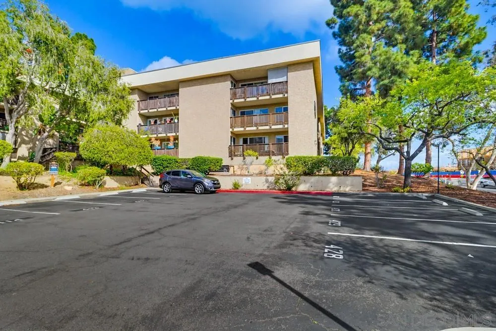 6416 Friars Road, Unit 111 San Diego, CA 92108 - Photo 21 of 21 front view of a house with a street