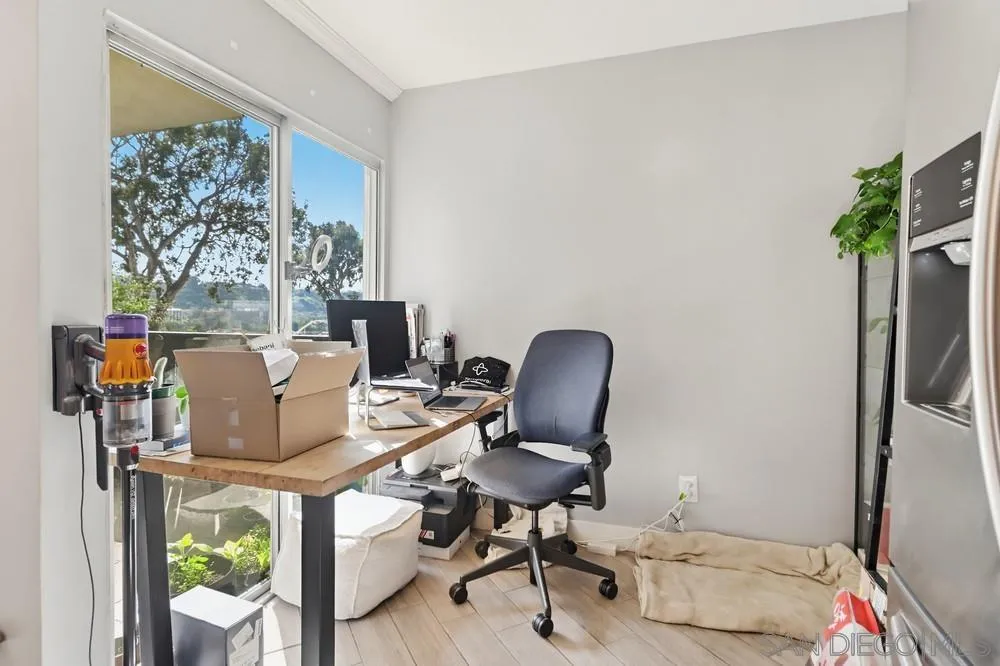 6416 Friars Road, Unit 111 San Diego, CA 92108 - Photo 8 of 21 a work room with furniture and a window