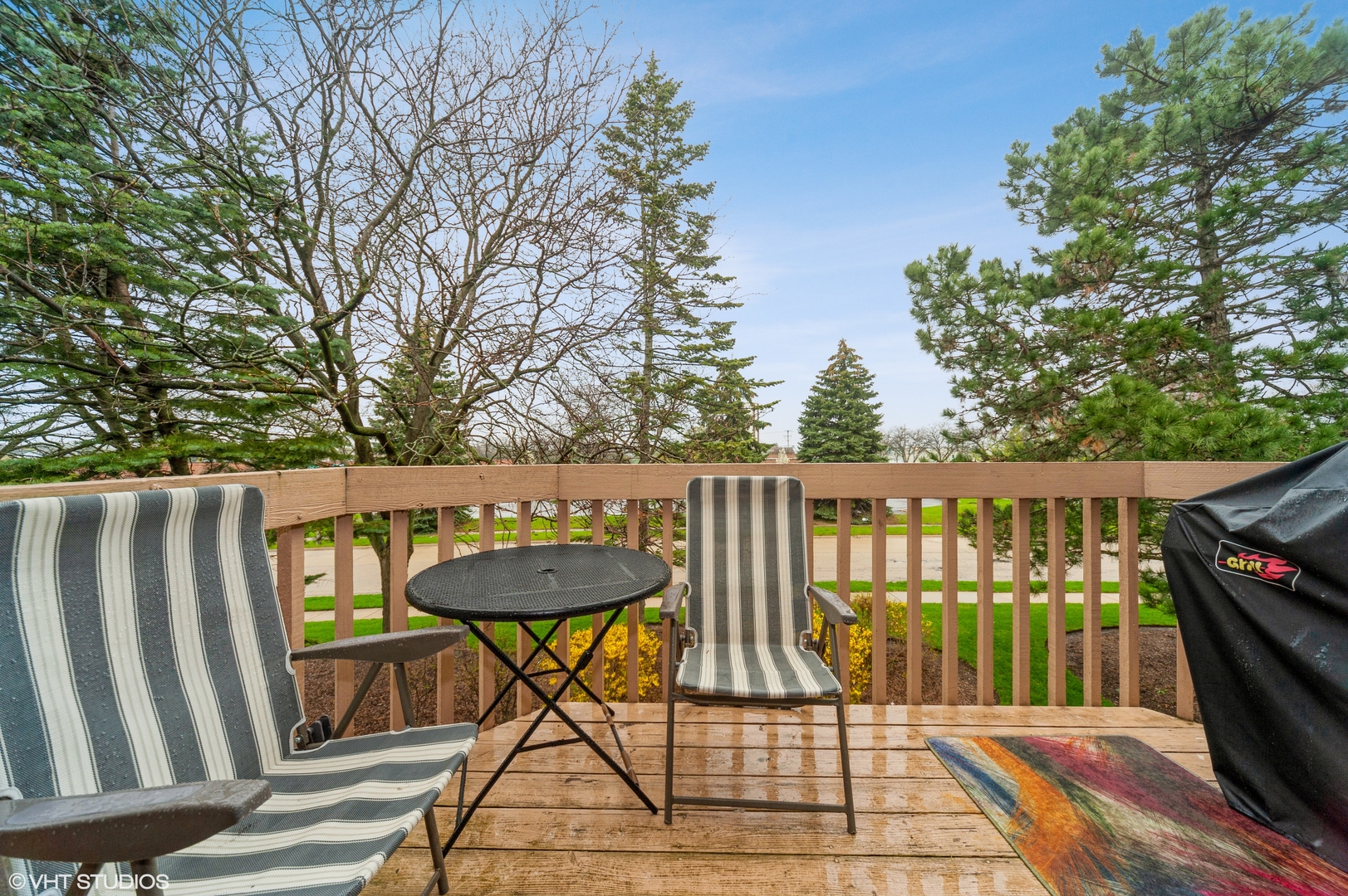 903 Ridgefield Lane Wheeling, IL 60090 - Photo 12 of 15 a view of balcony with wooden floor and outdoor seating