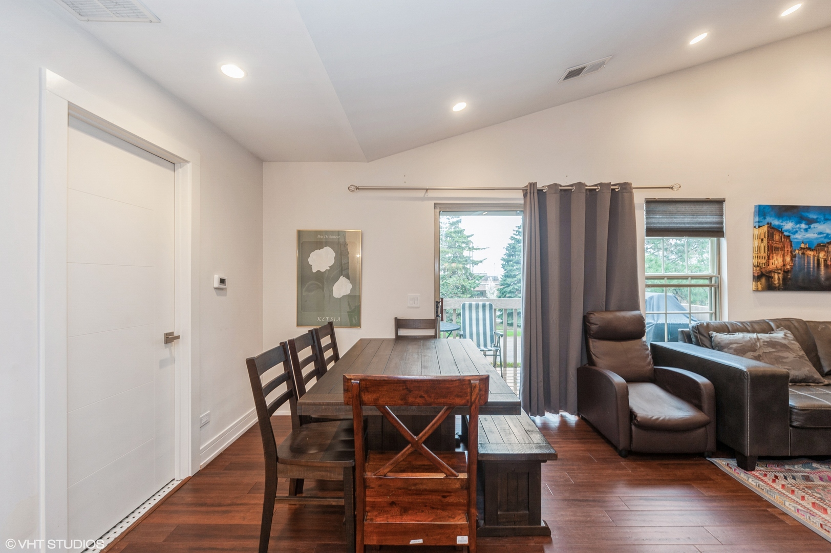 903 Ridgefield Lane Wheeling, IL 60090 - Photo 4 of 15 a view of a dining room with furniture and wooden floor