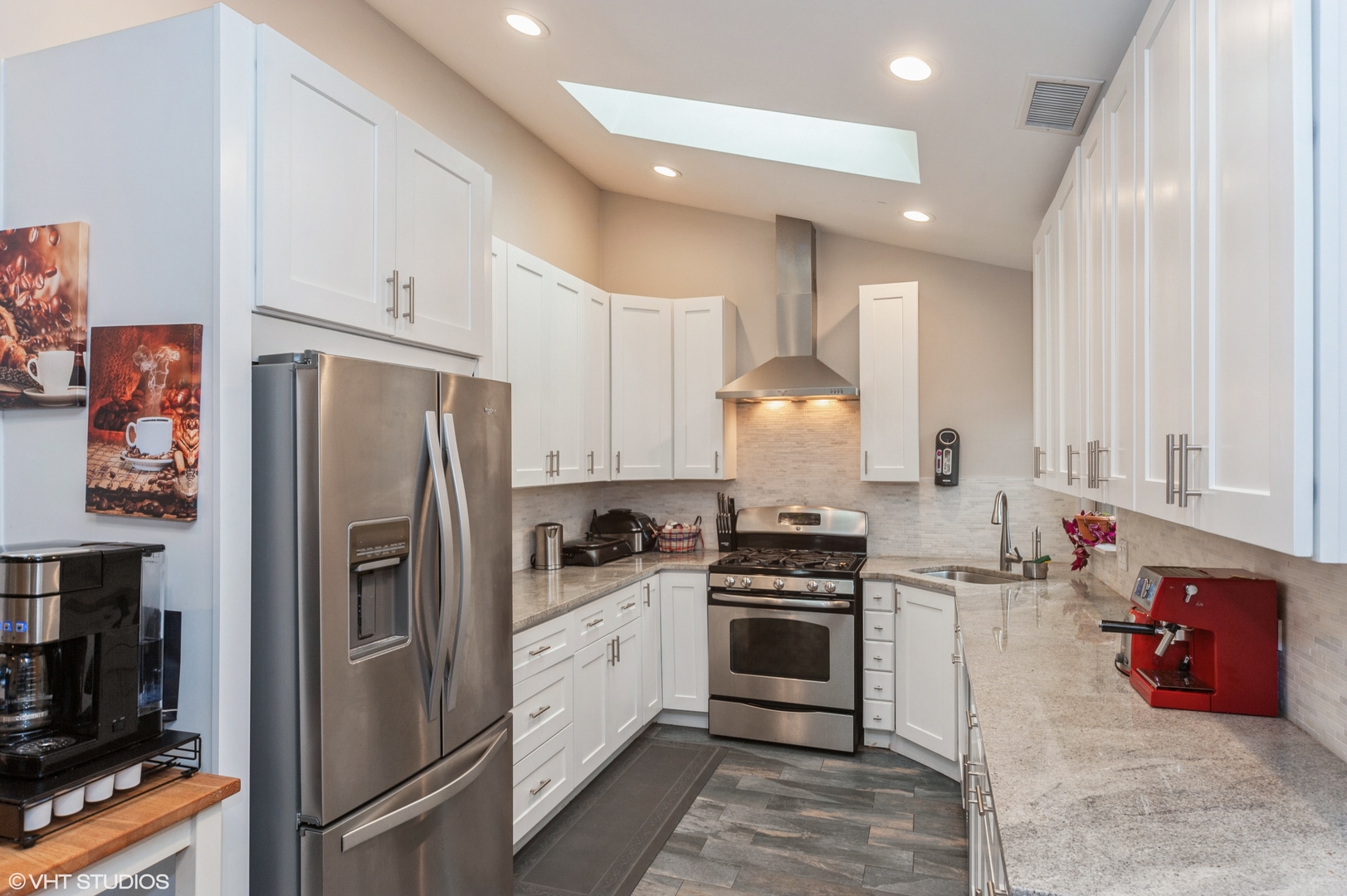 903 Ridgefield Lane Wheeling, IL 60090 - Photo 6 of 15 a kitchen with stainless steel appliances a refrigerator sink and cabinets