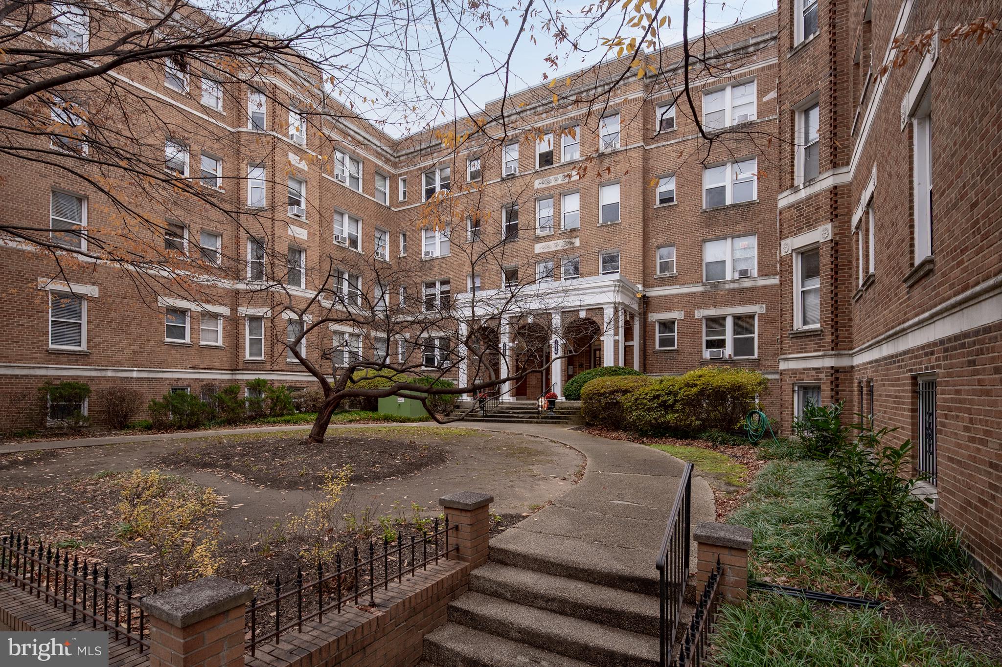 1820 Clydesdale Place Northwest, Unit 411 Washington, DC 20009 - Photo 22 of 33 a view of a building with a yard