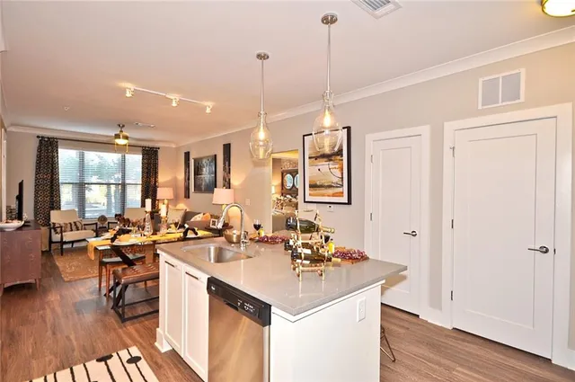 a room with lots of wooden furniture