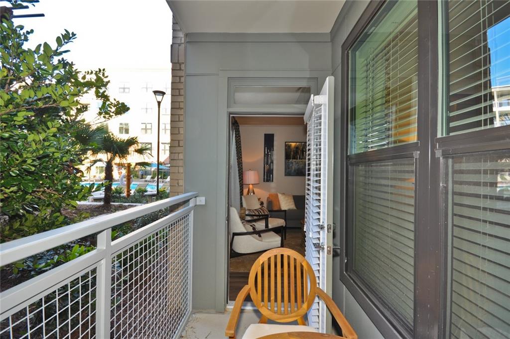 2875 Crescent Parkway, Unit 1117 Smyrna, GA 30080 - Photo 14 of 23 a balcony with view of outdoor space