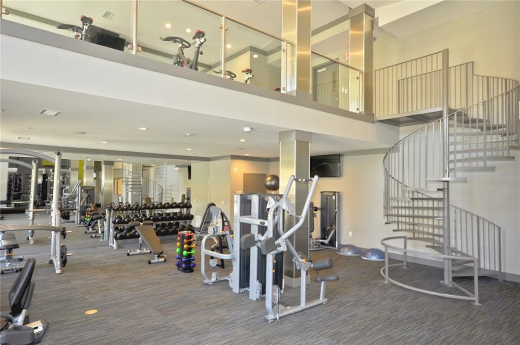 2875 Crescent Parkway, Unit 1117 Smyrna, GA 30080 - Photo 18 of 23 a view of a room with gym equipment