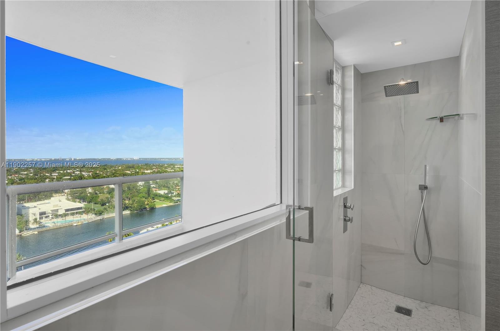4201 Collins Avenue, Unit 2101 Miami Beach, FL 33140 - Photo 35 of 50 a bathroom with a shower