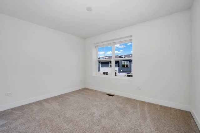 a bathroom with a toilet sink vanity tub and shower