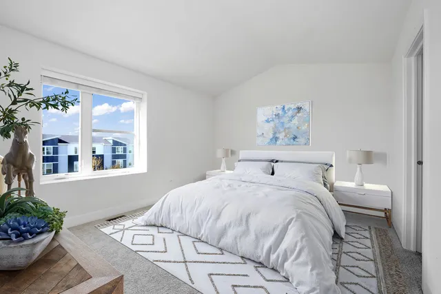 an empty room with windows and closet