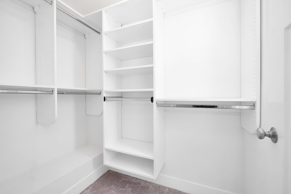 4133 Calder Lane Aurora, IL 60504 - Photo 20 of 38 a view of walk in closet with empty racks