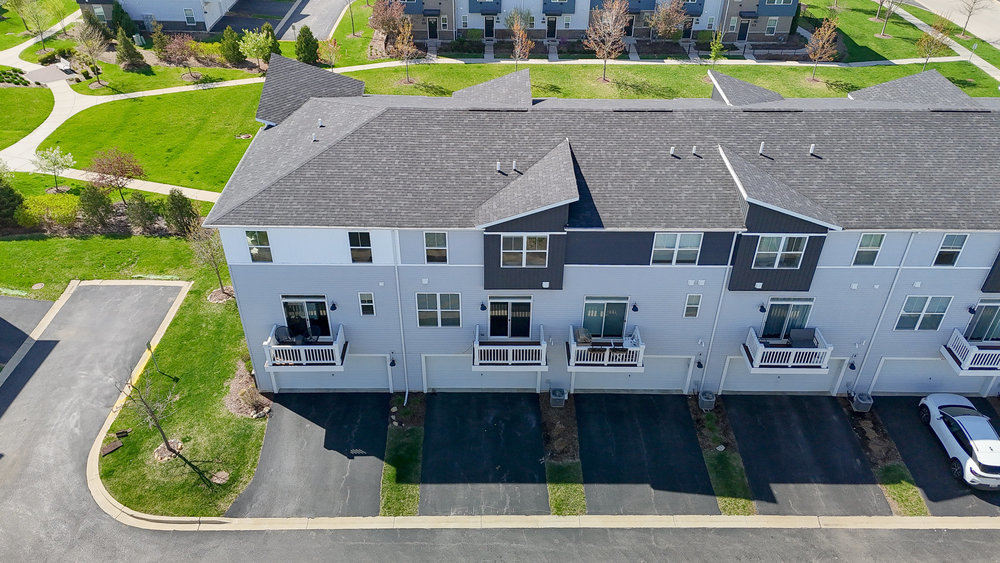 4133 Calder Lane Aurora, IL 60504 - Photo 28 of 38 a view of a house with a yard