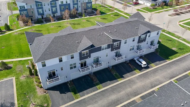 a sign on a wall in front of building