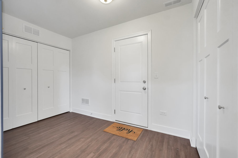 4133 Calder Lane Aurora, IL 60504 - Photo 3 of 38 a view of a room with wooden floor