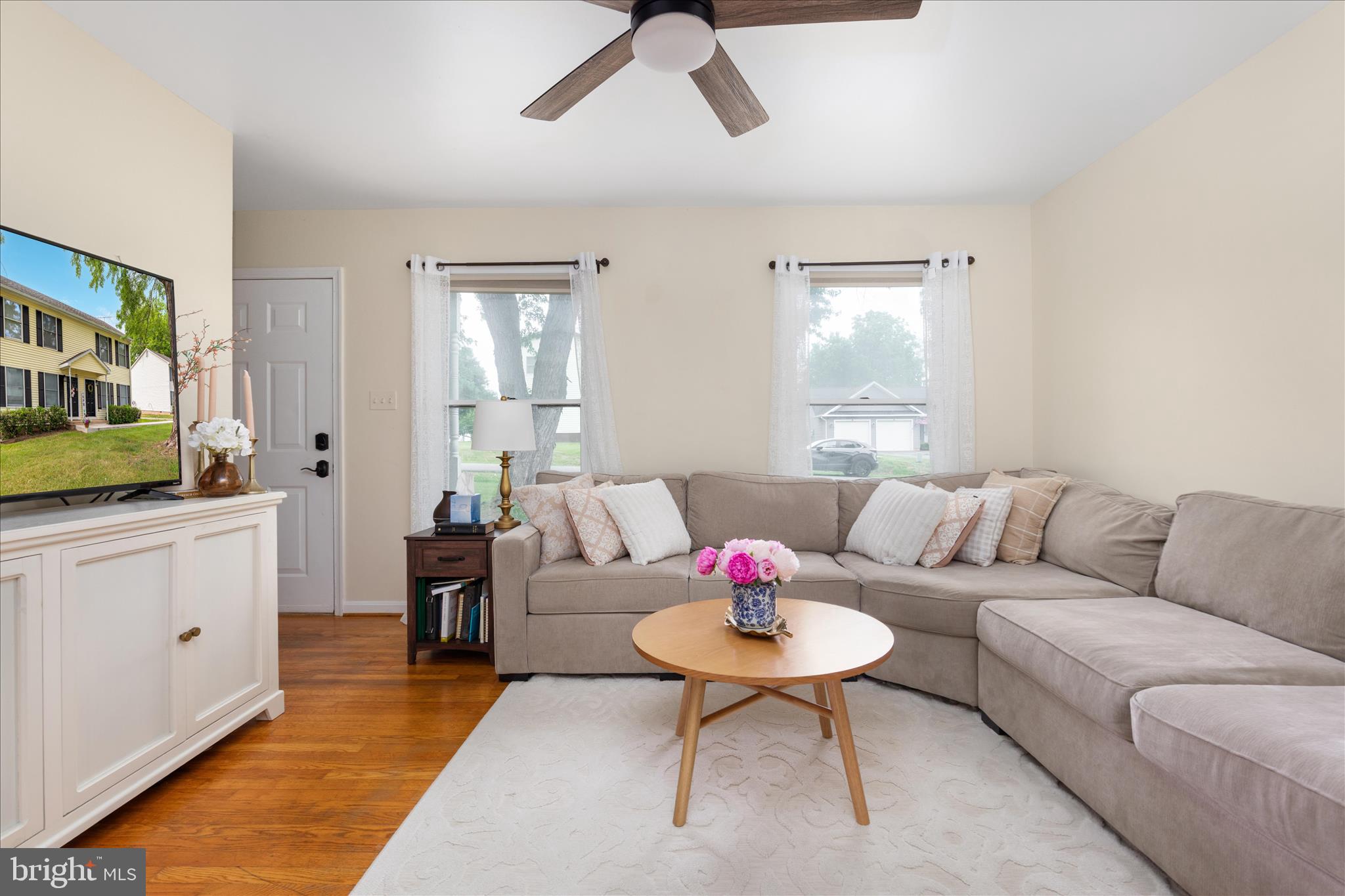 208 North Rappahannock Street Remington, VA 22734 - Photo 3 of 21 a living room with furniture and a large window