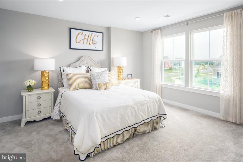 3510 Wildview Lane York, PA 17404 - Photo 4 of 17 a spacious bedroom with a bed and a window