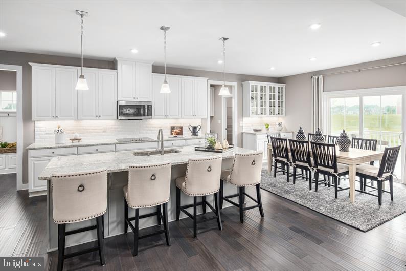 3510 Wildview Lane York, PA 17404 - Photo 7 of 17 a large kitchen with a table and chairs