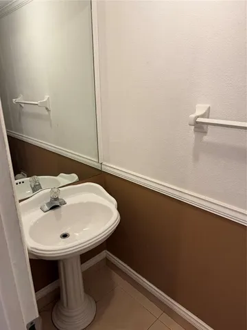 a view of a lake with houses in the back