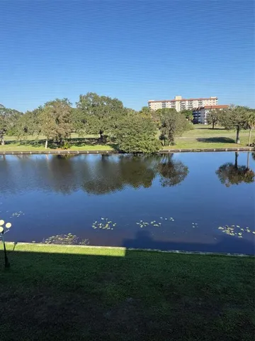 a view of a lake with a city view
