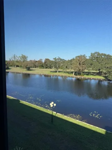 a kitchen with stainless steel appliances a stove a sink and a refrigerator