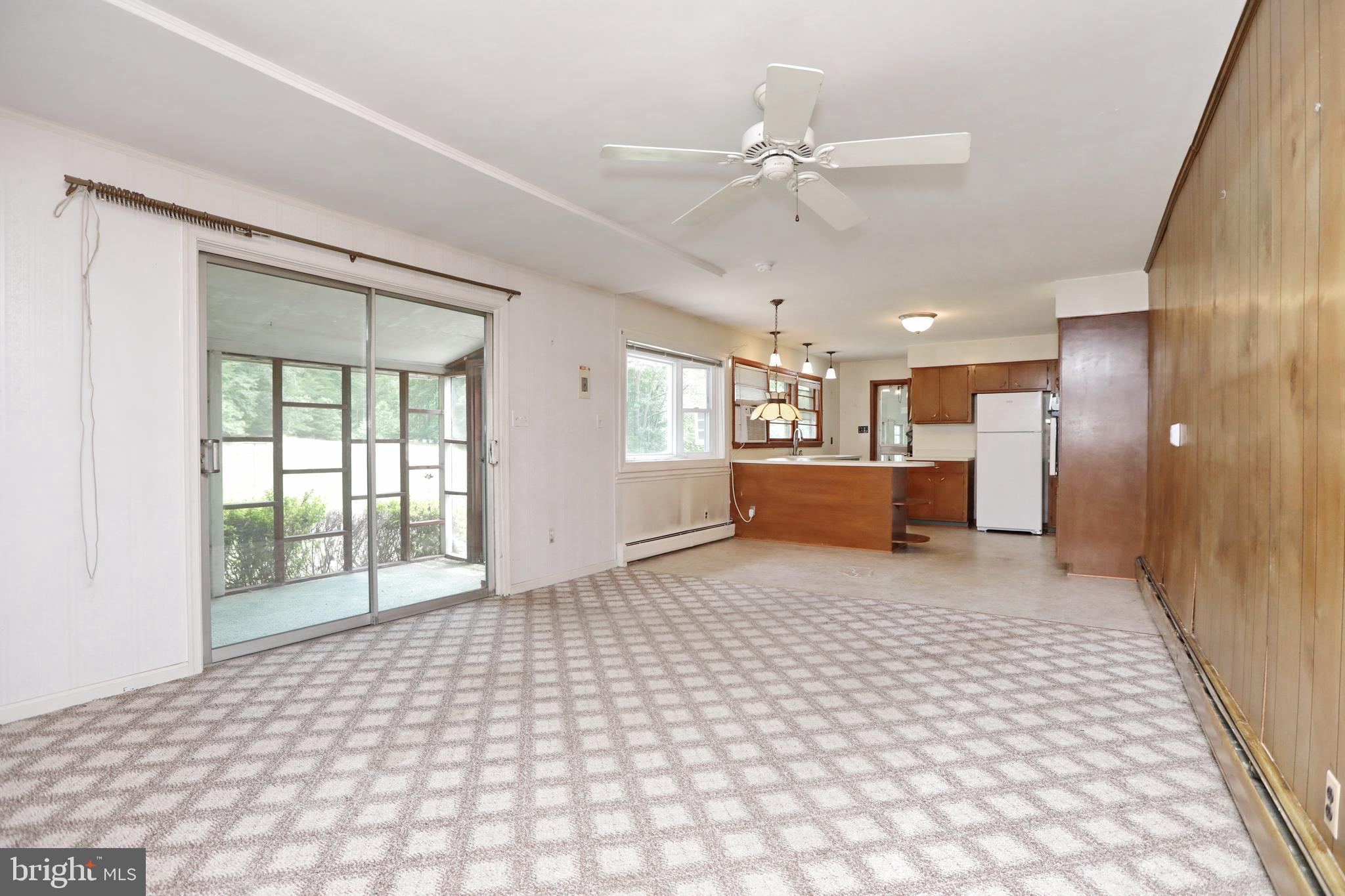 10901 Cross Rd Trail Brandywine, MD 20613 - Photo 20 of 50 Family Room with sliding doors to screened porch