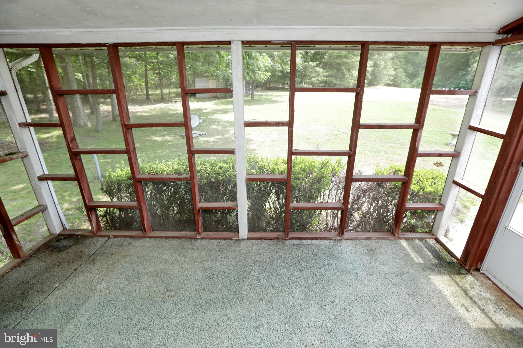 10901 Cross Rd Trail Brandywine, MD 20613 - Photo 41 of 50 Screened Porch off of Family Room