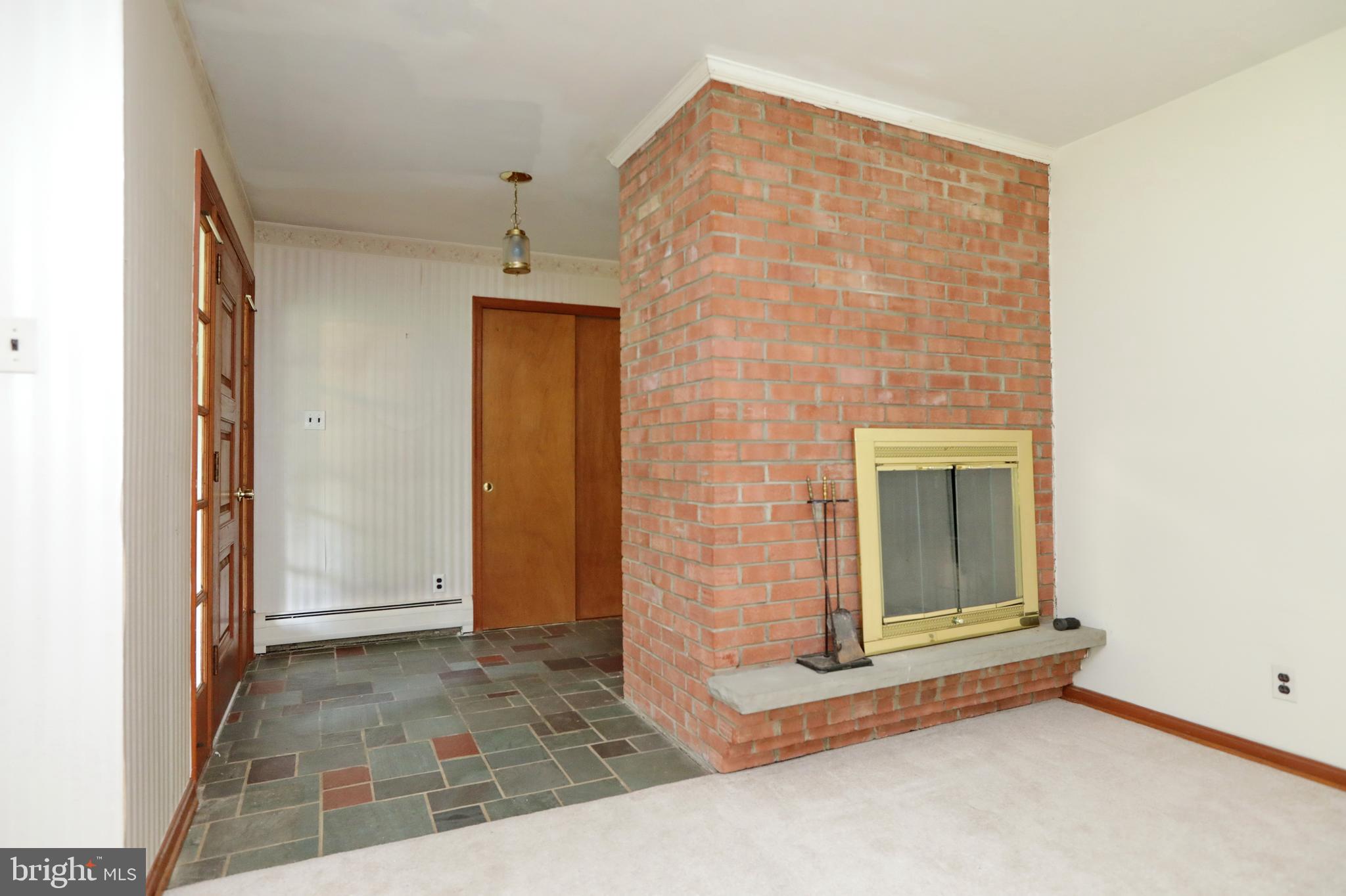 10901 Cross Rd Trail Brandywine, MD 20613 - Photo 8 of 50 Brick Fireplace in Living Room