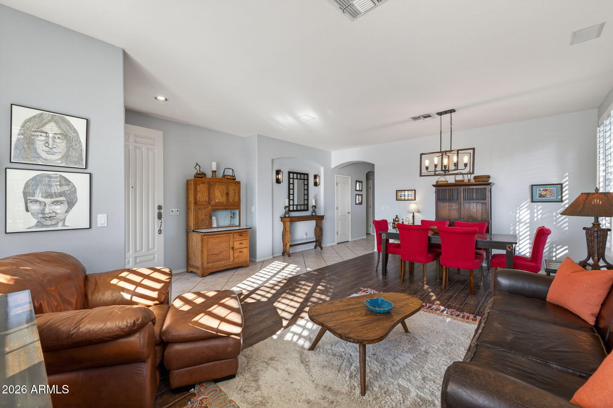 1622 West Nighthawk Way Phoenix, AZ 85045 - Photo 13 of 70 a living room with furniture and kitchen view