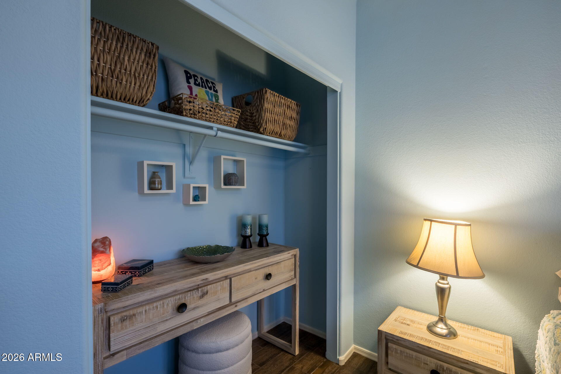 1622 West Nighthawk Way Phoenix, AZ 85045 - Photo 26 of 70 a room with a desk and a lamp on dresser