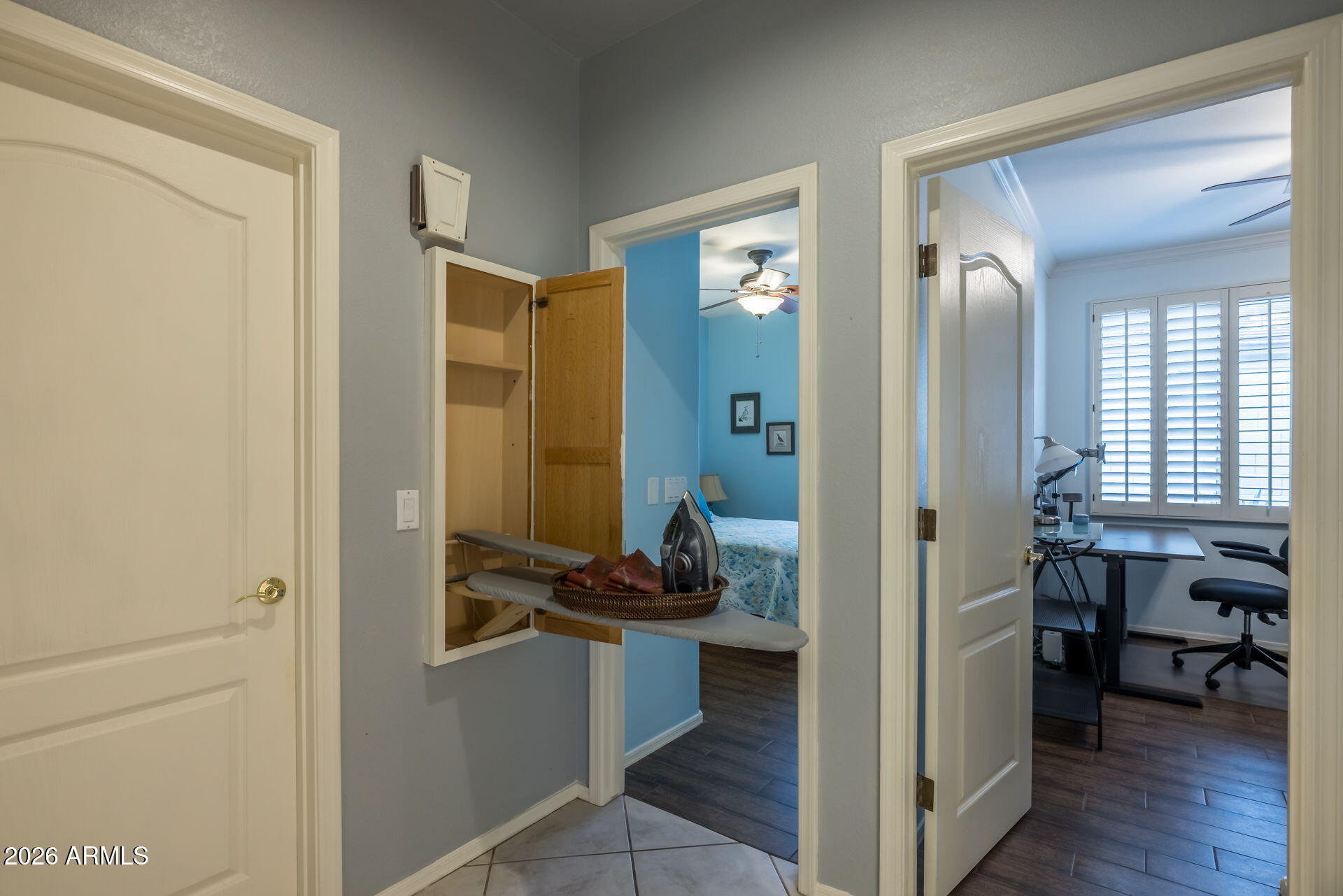 1622 West Nighthawk Way Phoenix, AZ 85045 - Photo 29 of 70 a bathroom with a granite countertop sink a toilet and a mirror