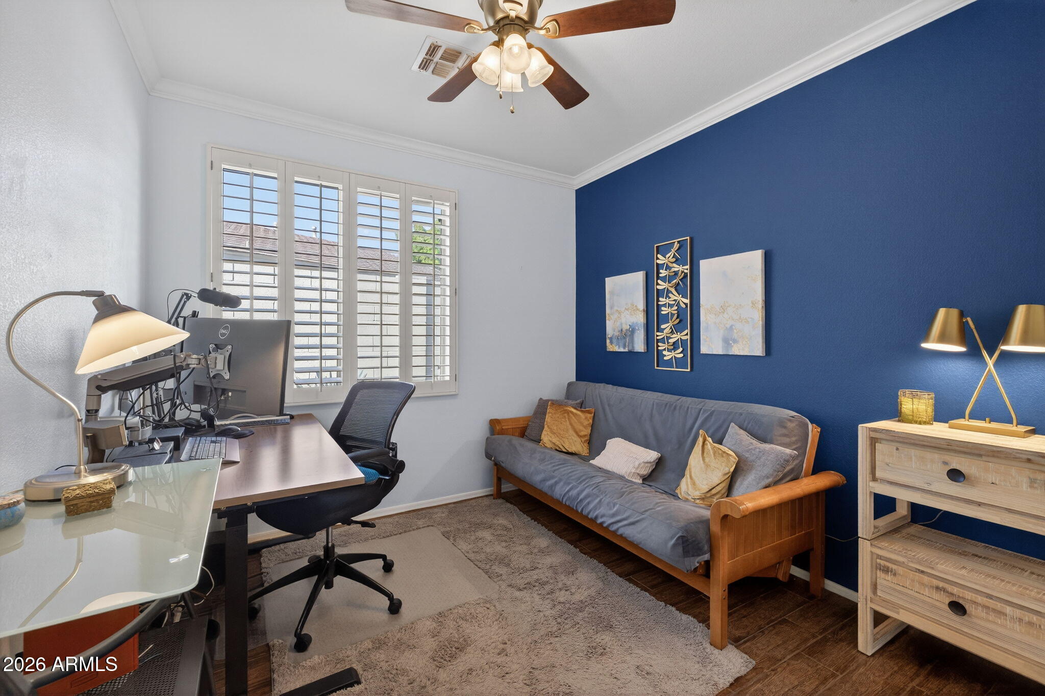 1622 West Nighthawk Way Phoenix, AZ 85045 - Photo 31 of 70 a living room with furniture and a window