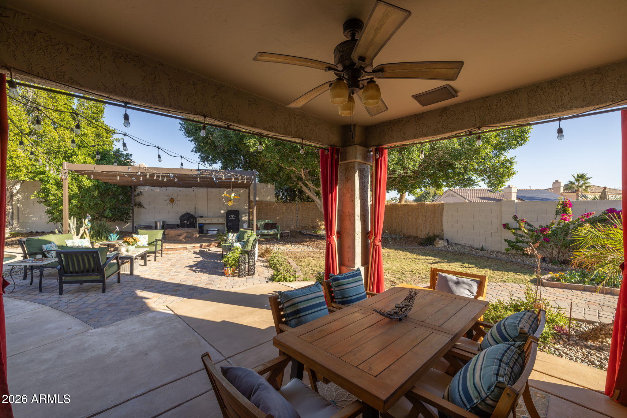 1622 West Nighthawk Way Phoenix, AZ 85045 - Photo 37 of 70 a view of an outdoor dining space with a table and chairs